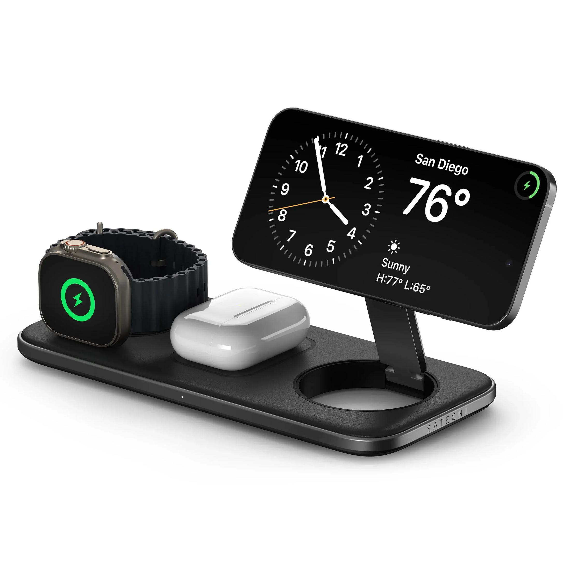Schwarzes Ladegerät mit einer Smartwatch, kabellosen Ohrhörern und einem Smartphone.