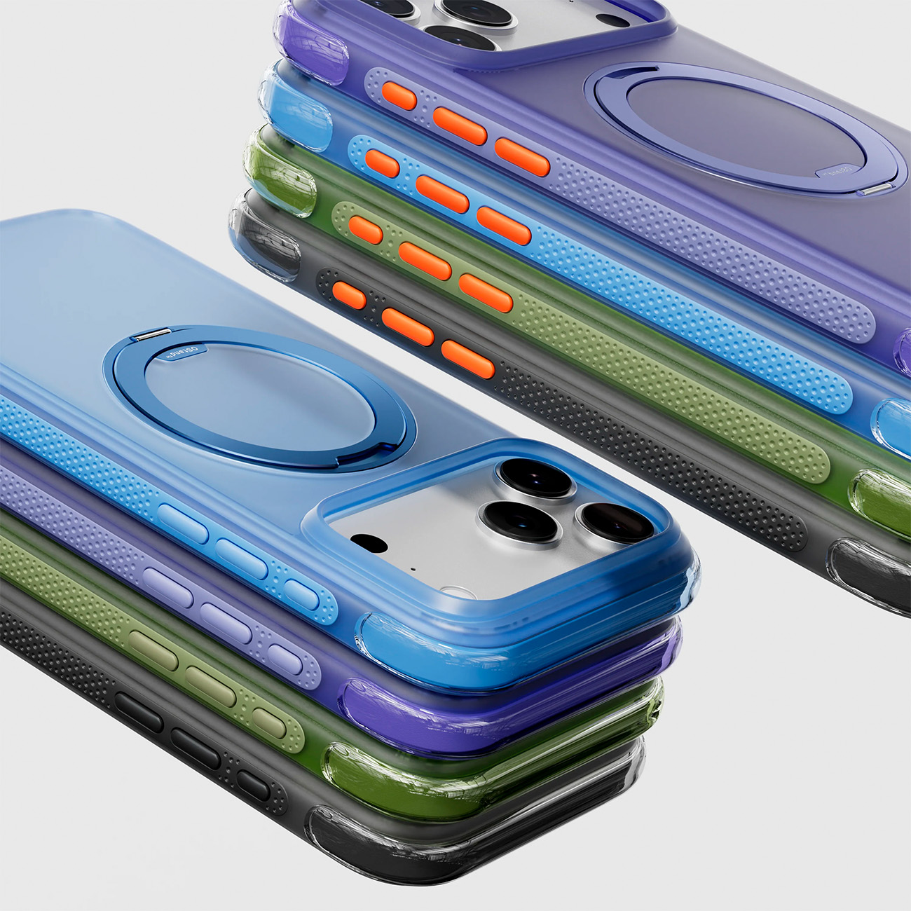 Varias fundas de teléfono coloridas con un soporte de anillo, apiladas.
