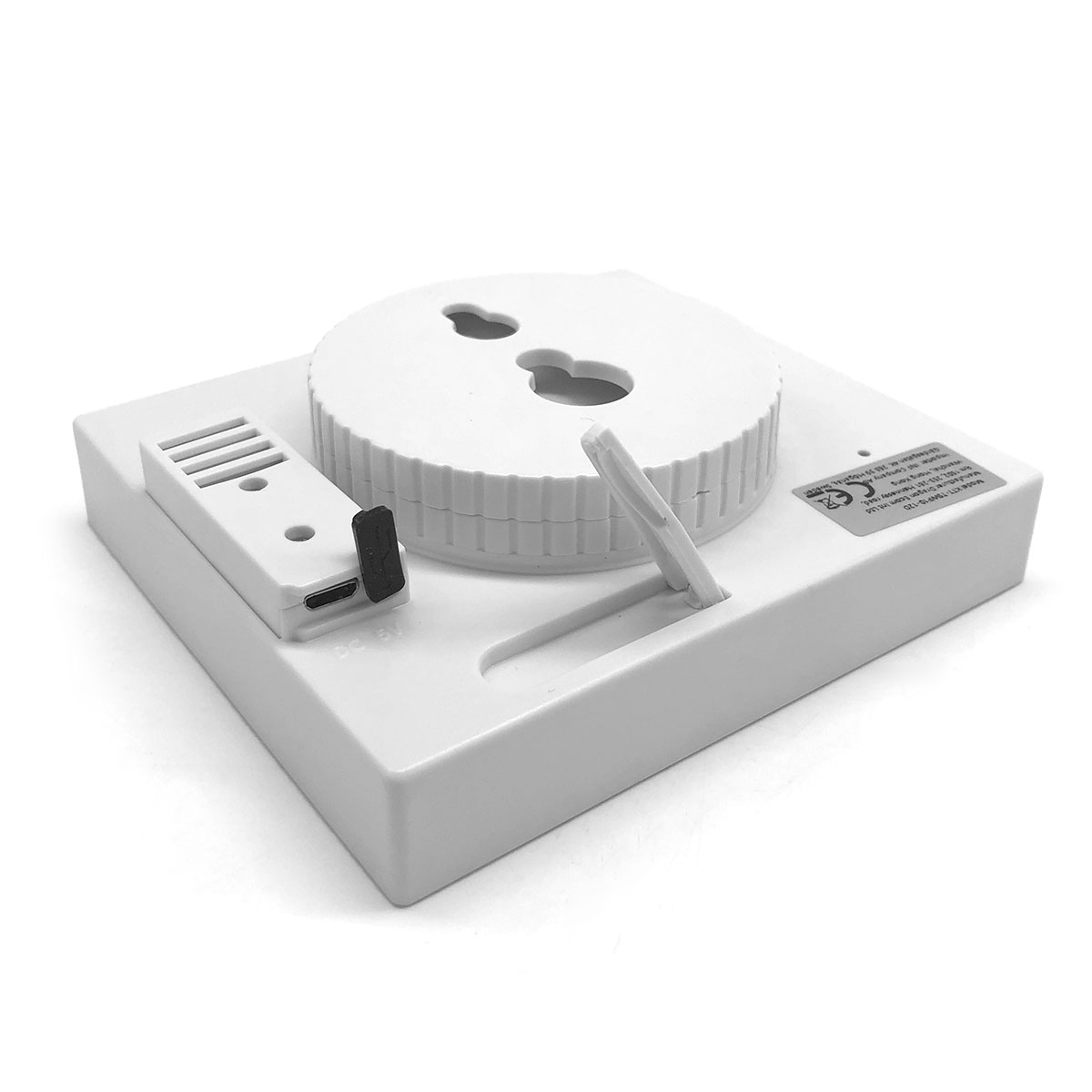Białe urządzenie elektroniczne z portem USB i obrotową częścią.