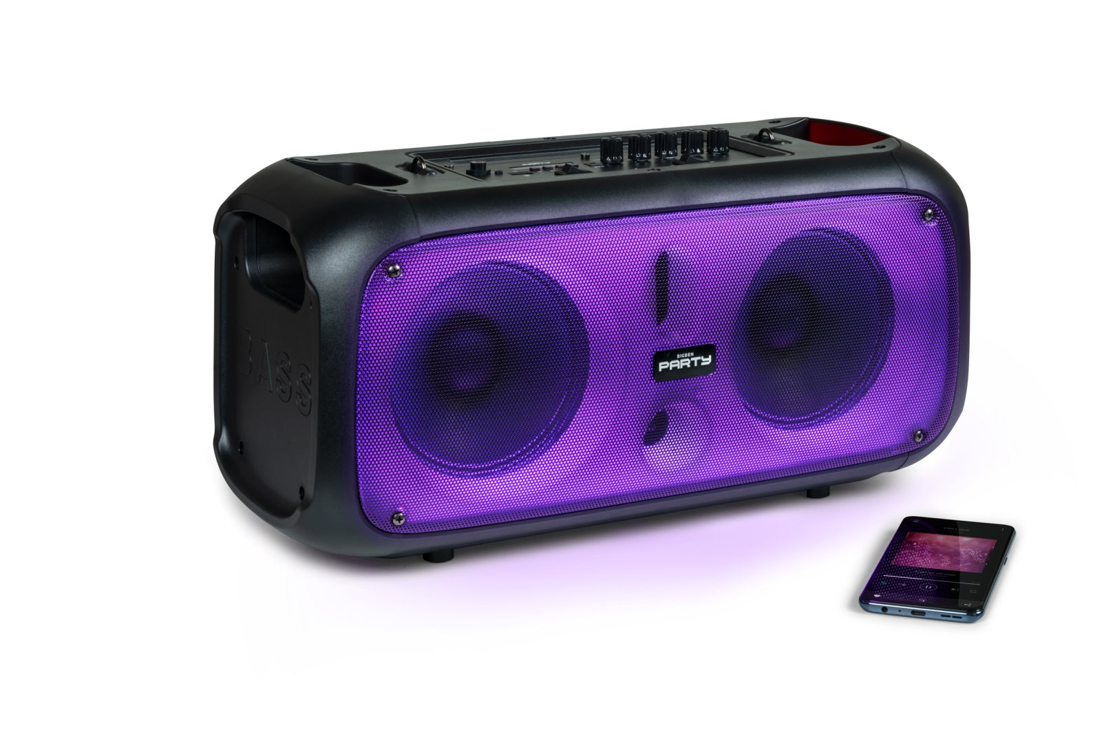 Altavoz portátil negro con luces moradas y un smartphone delante.