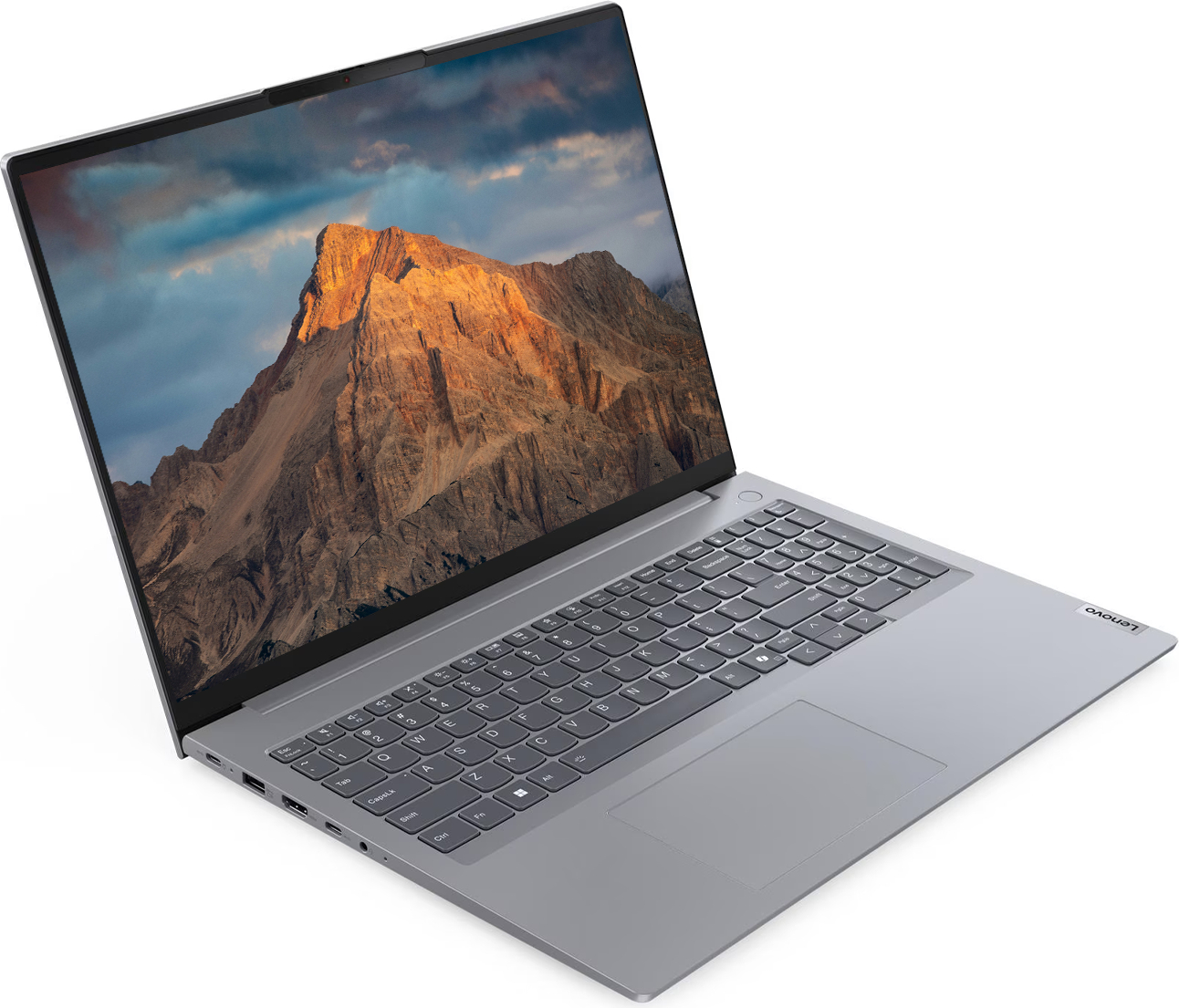 Ekranında dağ manzarası ve tam klavyesi olan gümüş renkli Lenovo dizüstü bilgisayar.