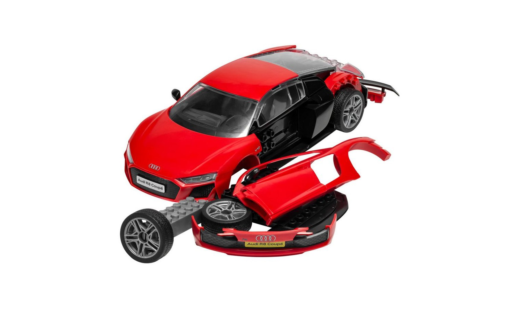 Ein zerlegtes rotes Audi R8 Coupé Spielzeugauto mit schwarzen Akzenten auf weißem Hintergrund.