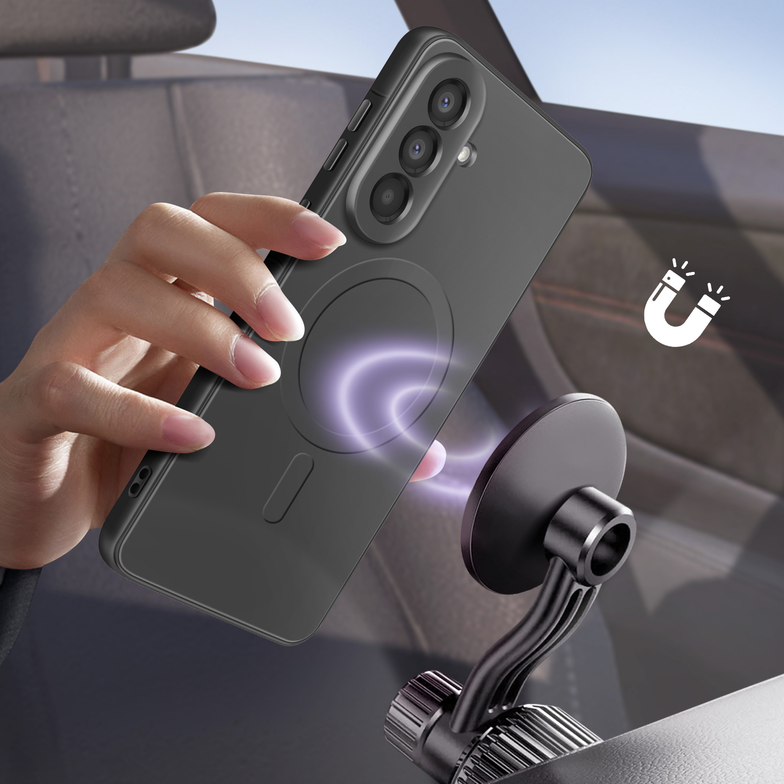Hand houdt zwarte telefoon met magneetring bij autohouder.