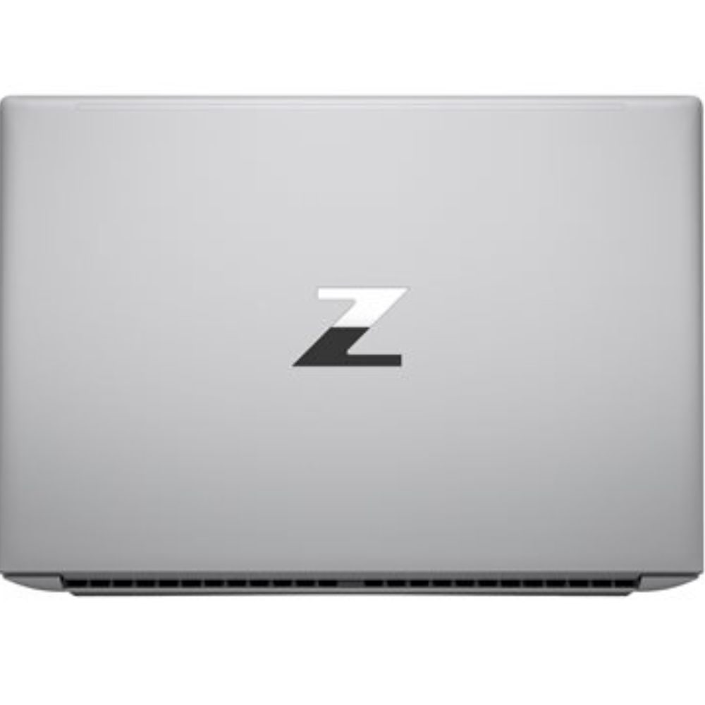 Un ordinateur portable argenté fermé avec un logo Z noir et blanc sur le couvercle.