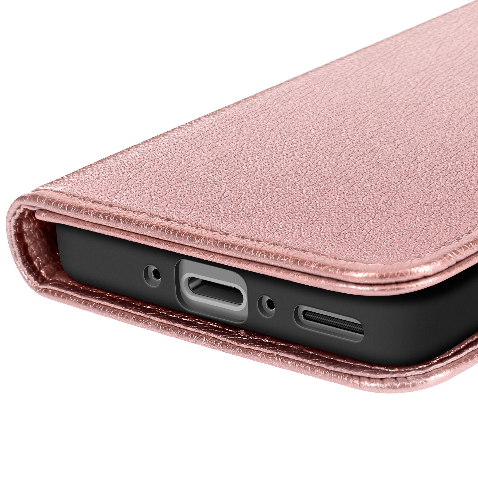 Primer plano de una funda de teléfono rosa dorada mostrando puertos.