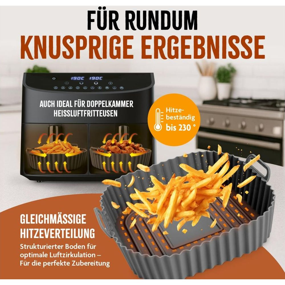 Doppelkammer-Heißluftfritteuse mit Pommes und Hähnchenteilen. Hitzebeständig bis 230°C.