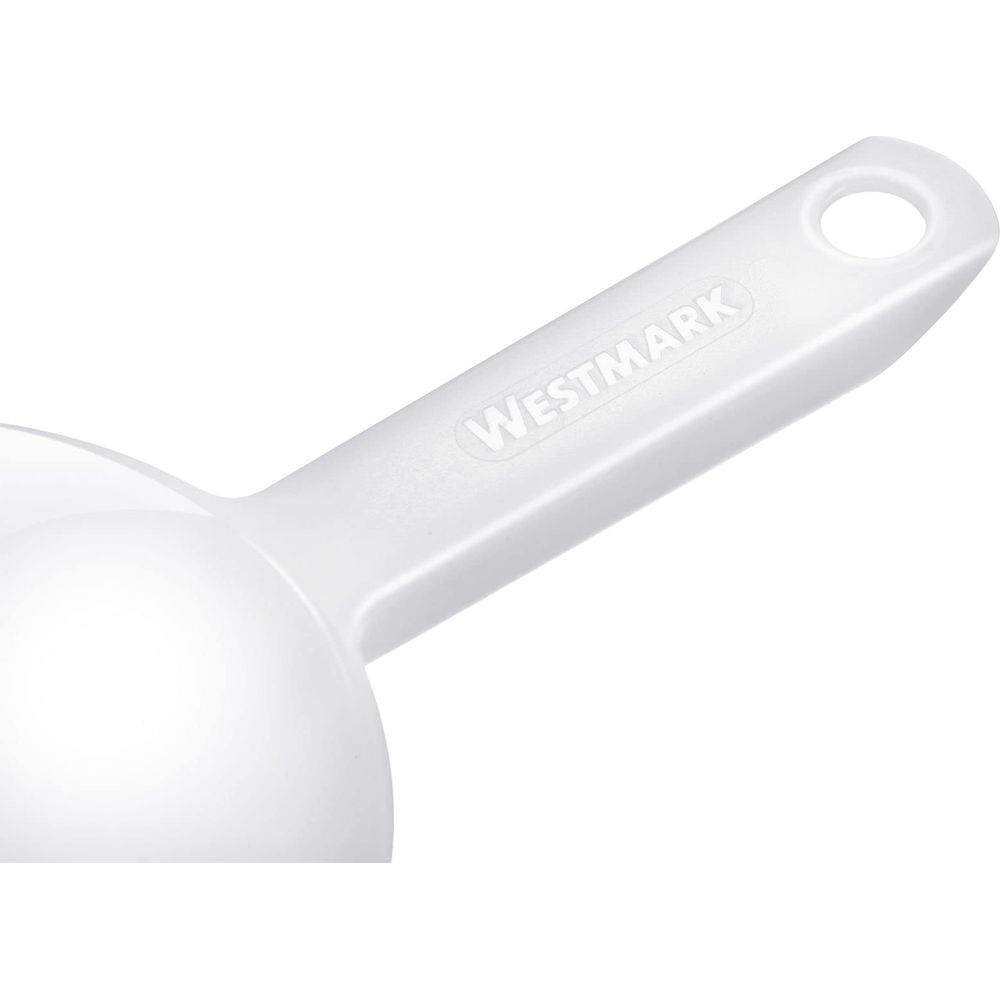Un misurino bianco in plastica con il nome del marchio Westmark sul manico.