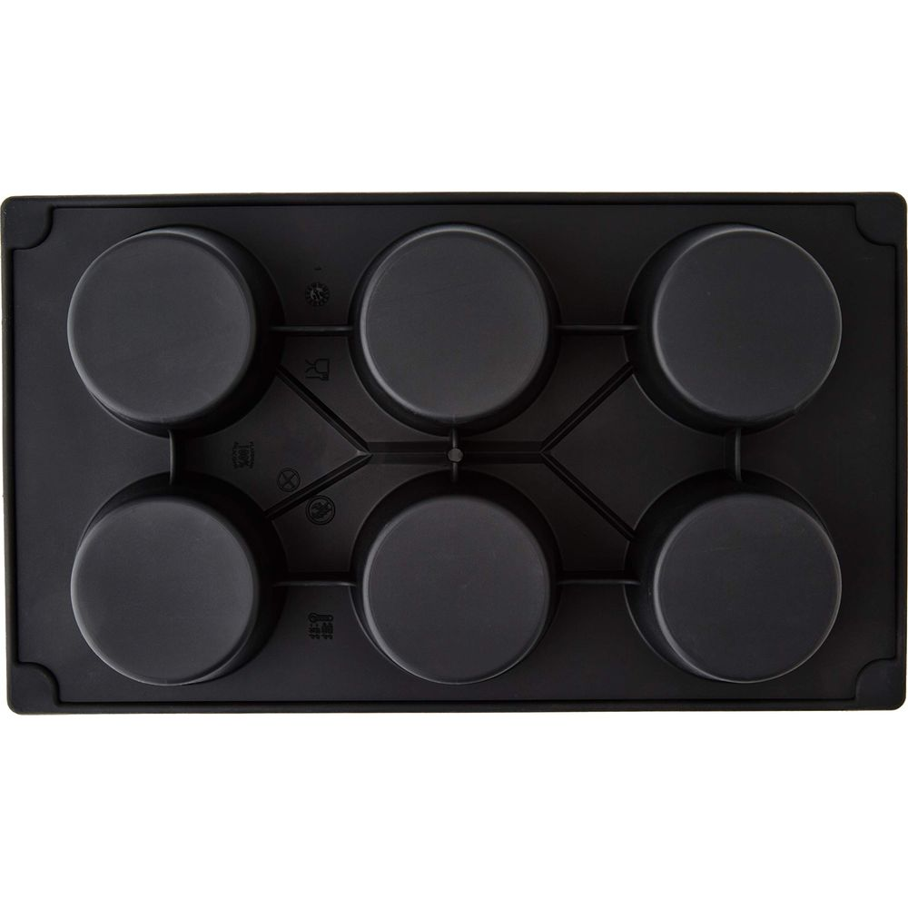 Un moule à pâtisserie noir avec six alvéoles rondes disposées en deux rangées.