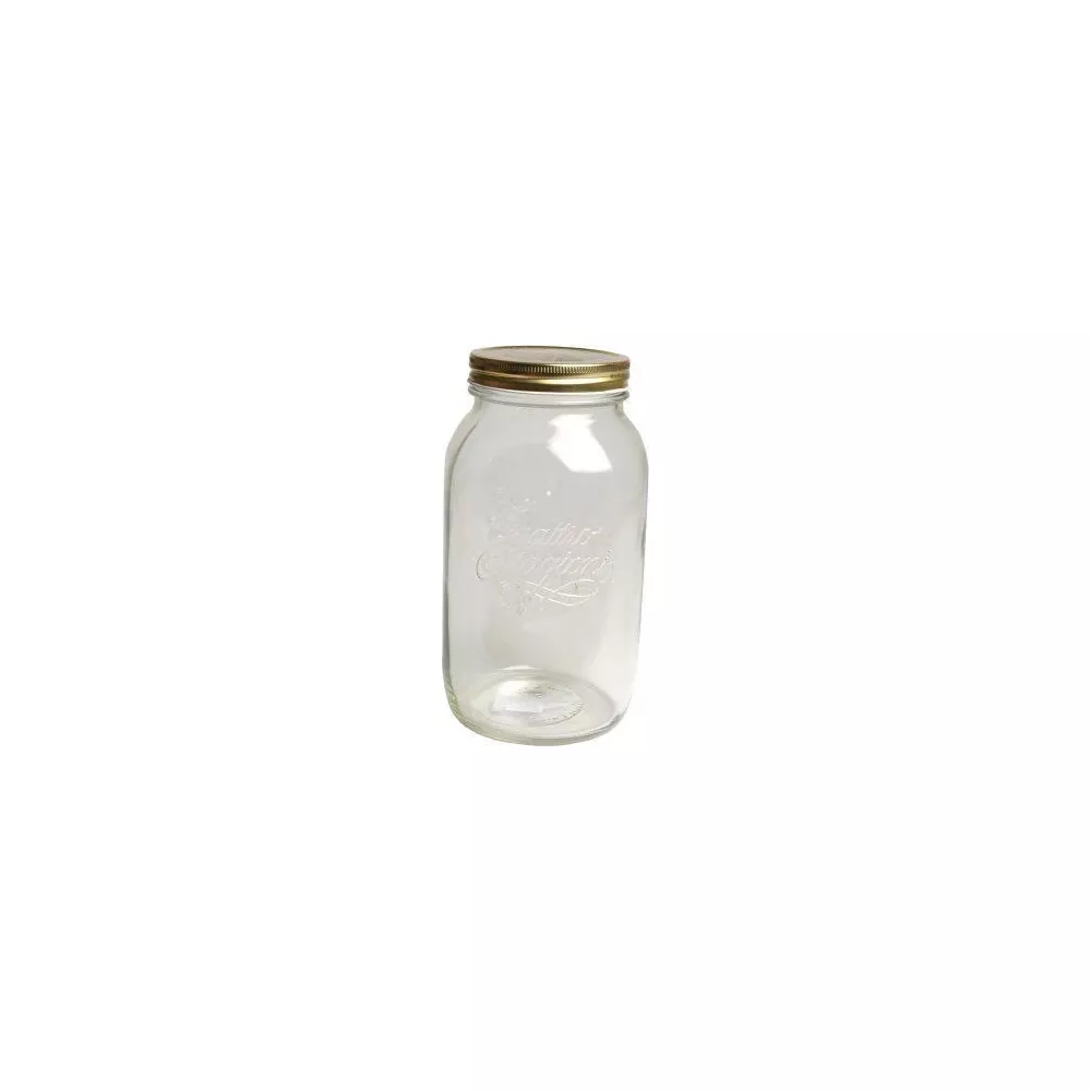 Un bocal en verre vide avec un couvercle doré sur fond blanc.