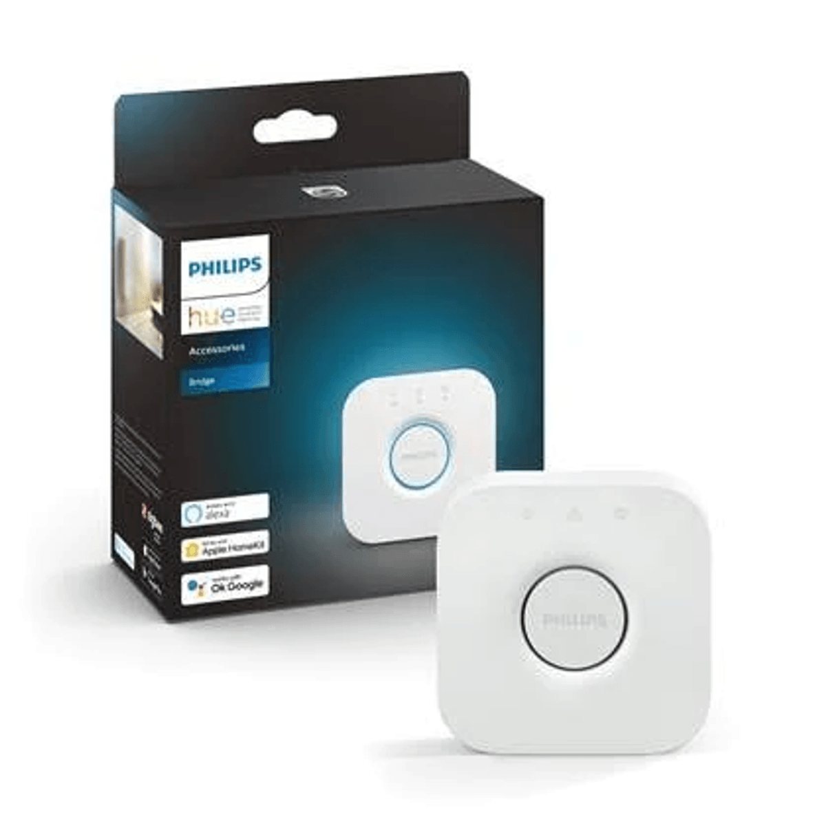 Un dispositivo puente de accesorio Philips Hue blanco junto a su embalaje.