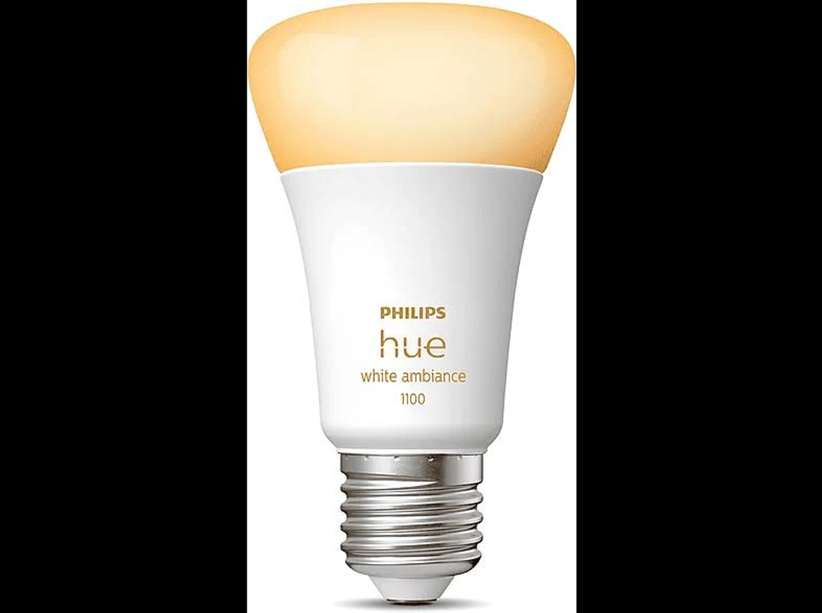 Een witte Philips Hue lamp gloeit met gouden licht.