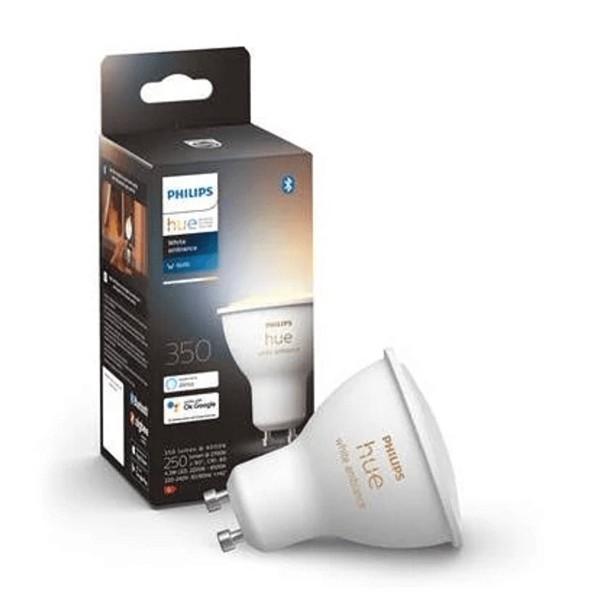 Weiße Philips Hue Lampe und Verpackung, mit Text und Logo.