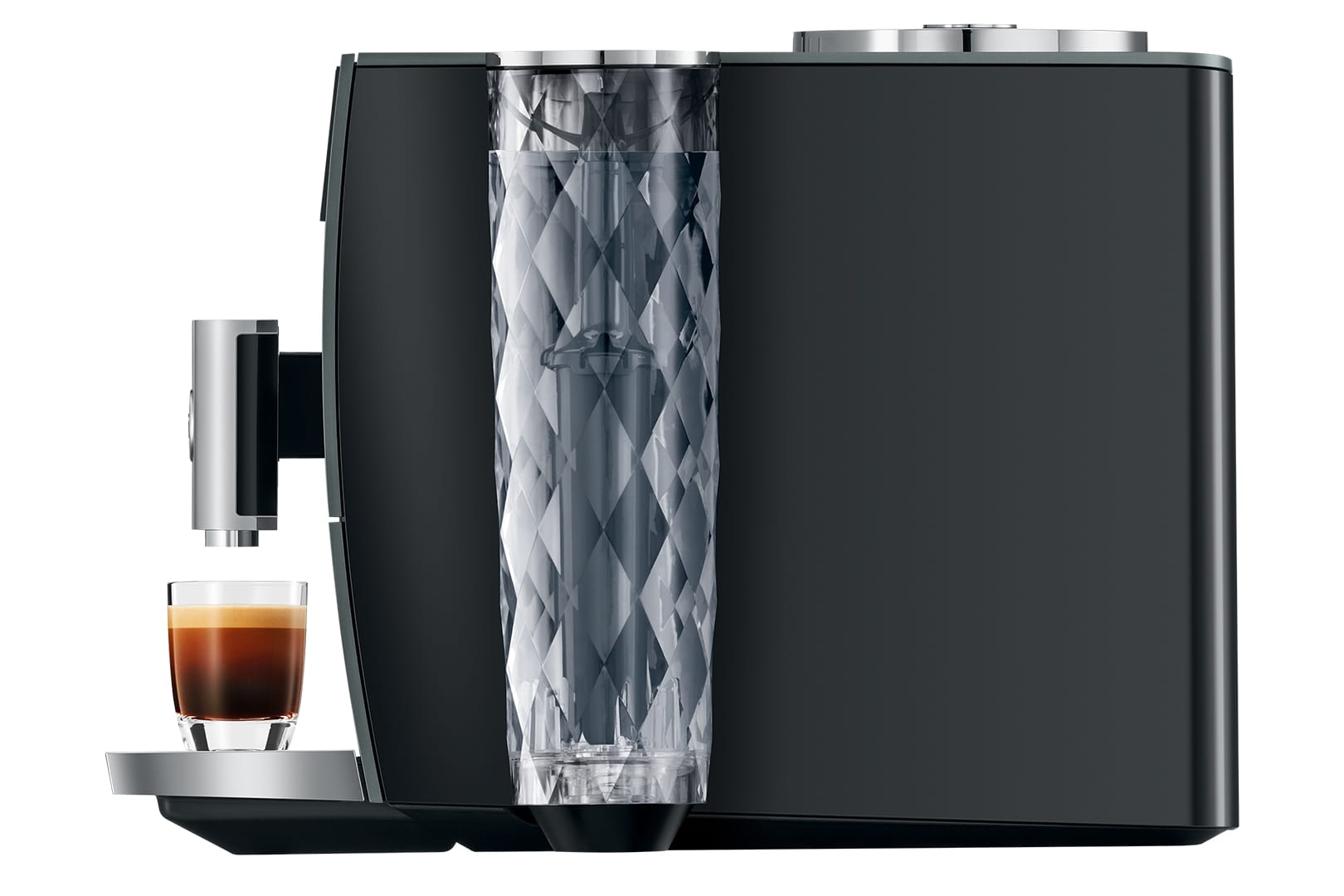 Una macchina da caffè nera con un bicchiere di espresso accanto.