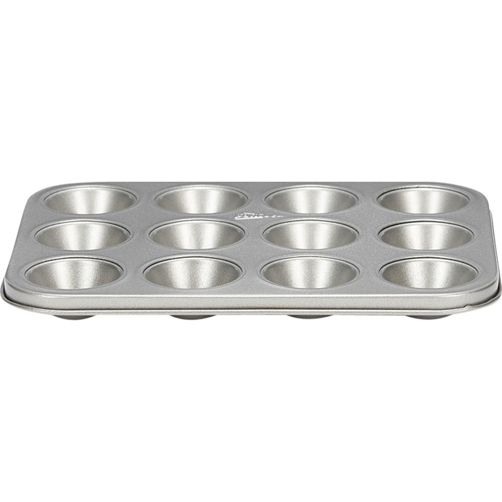 Prostokątna, srebrna forma do muffin z 12 okrągłymi wgłębieniami.