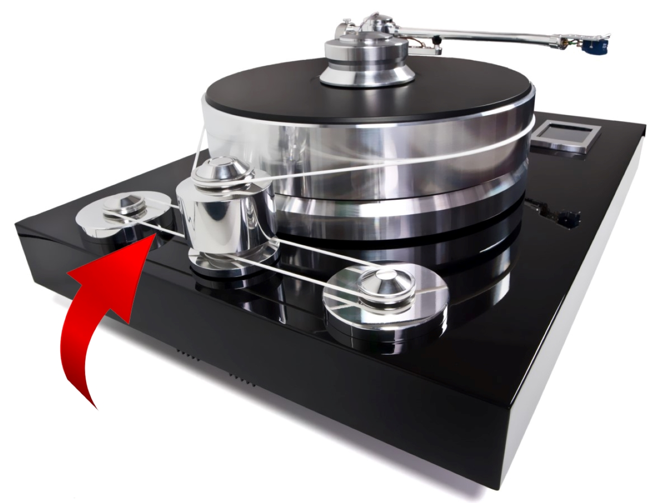 Czarny gramofon z srebrnymi detalami i czerwoną strzałką.