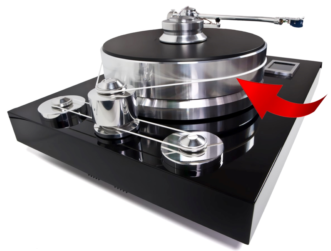 Czarny gramofon z srebrnymi akcentami i czerwoną strzałką.