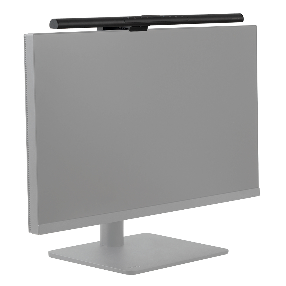 A black monitor light bar is mounted above a gray computer monitor.