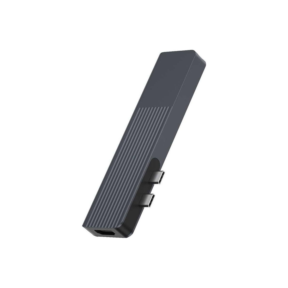 Un hub USB-C grigio scuro con texture a coste e più porte.
