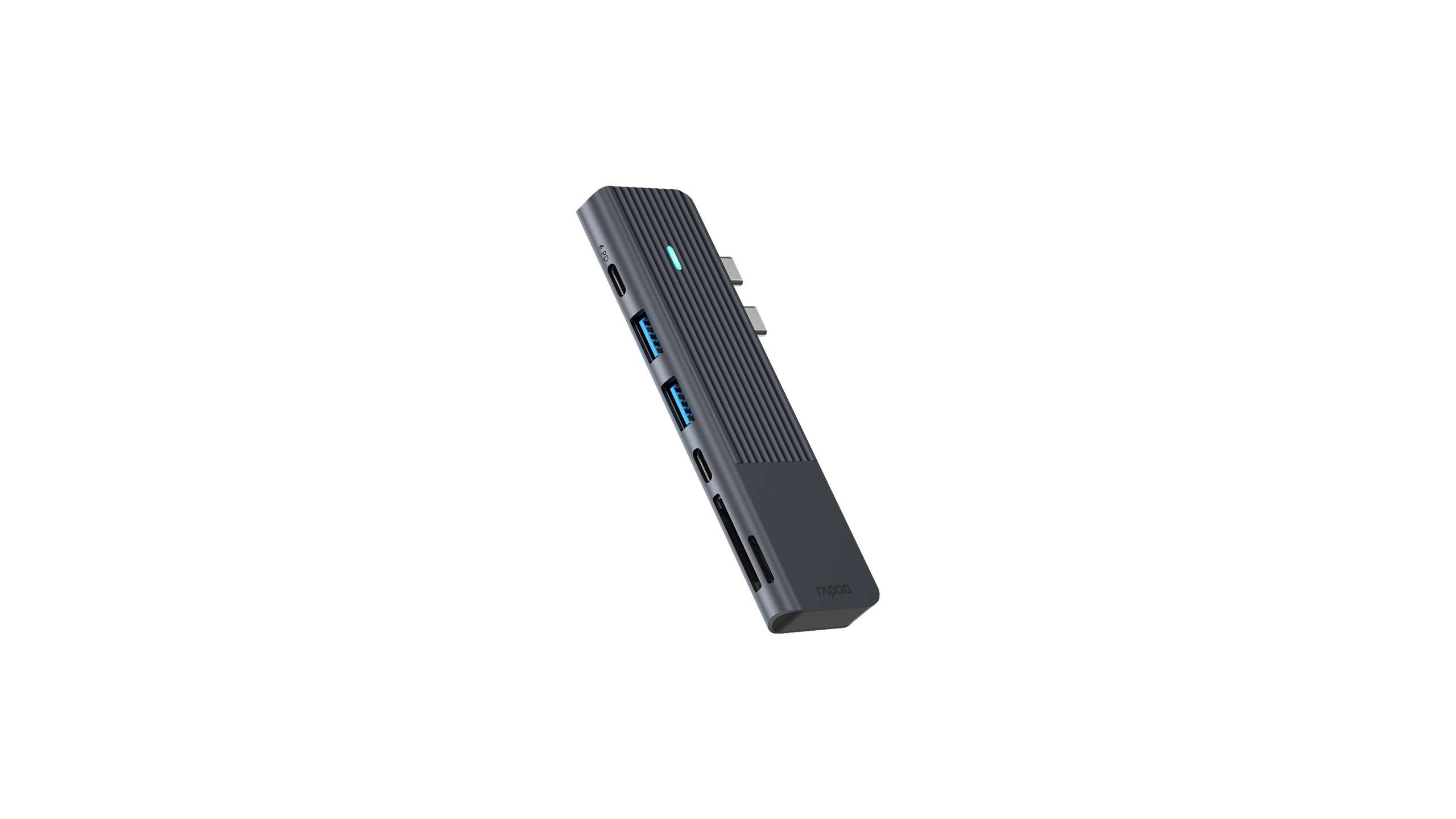 Hub USB-C grigio con texture a coste e diverse porte.