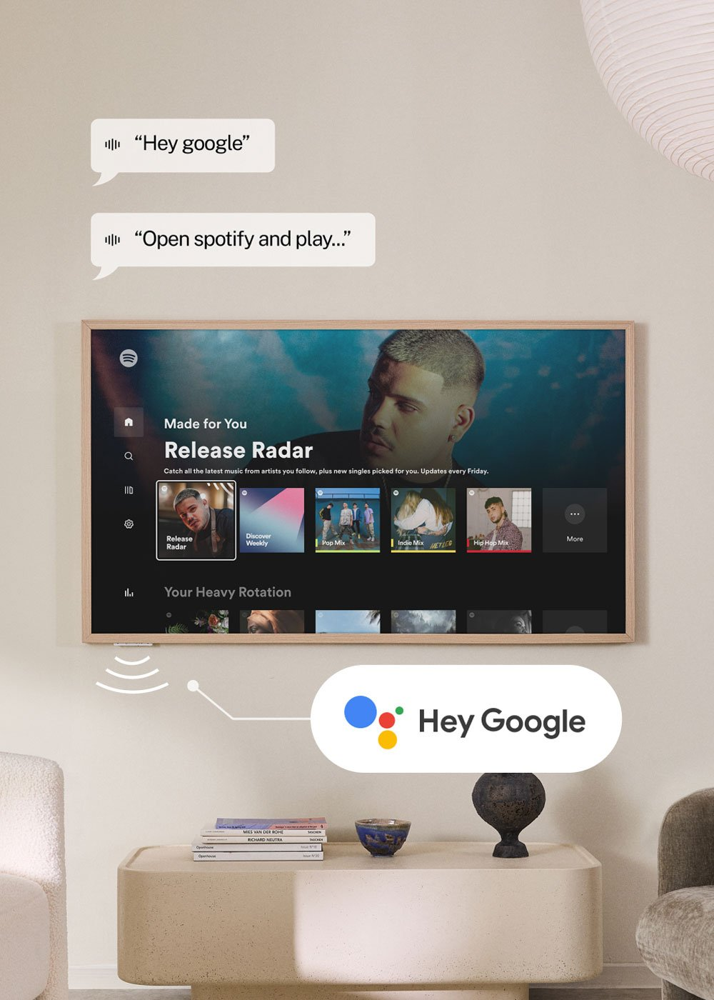 Un hombre en una pantalla de TV mostrando la app de Spotify. "Hey Google".