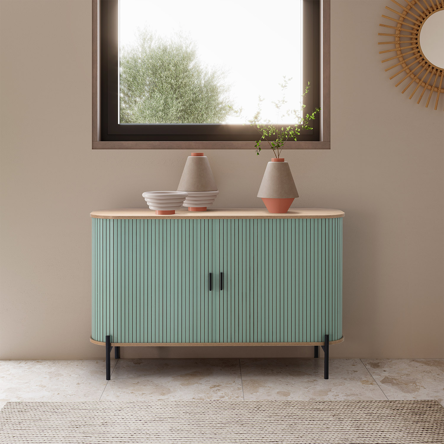Un mueble verde menta con tapa de madera se apoya en patas negras.