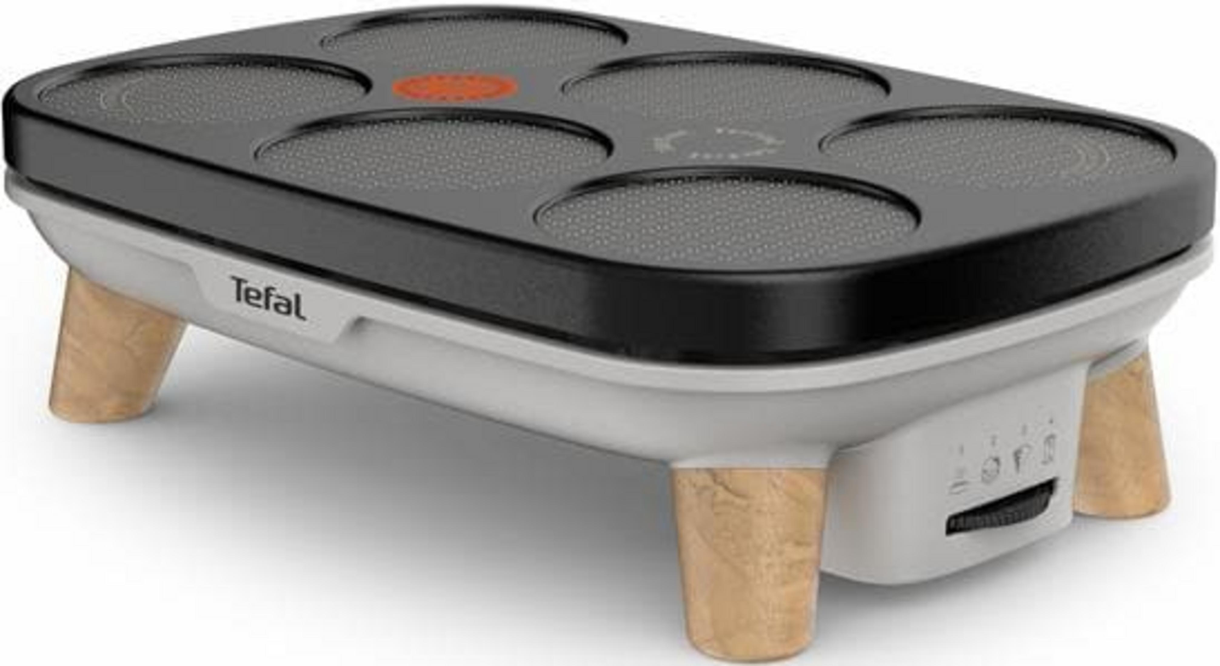 Tefal Crêpes-Maker mit 6 Mulden und Holzfüßen. Graue Oberfläche mit roten Akzenten.