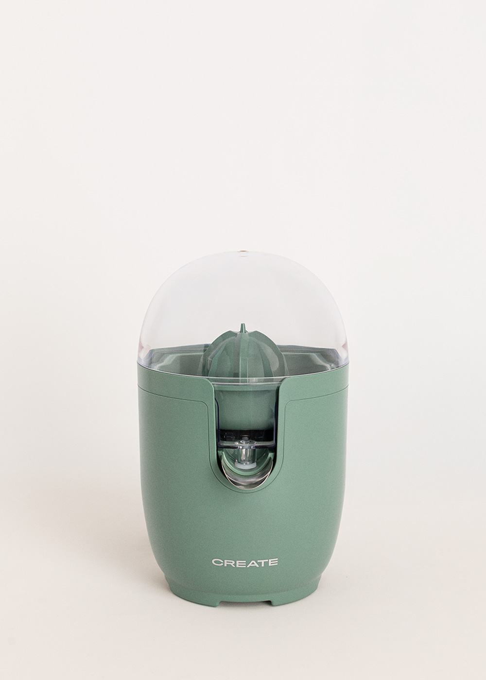 Exprimidor cítrico eléctrico verde con tapa transparente y pico.