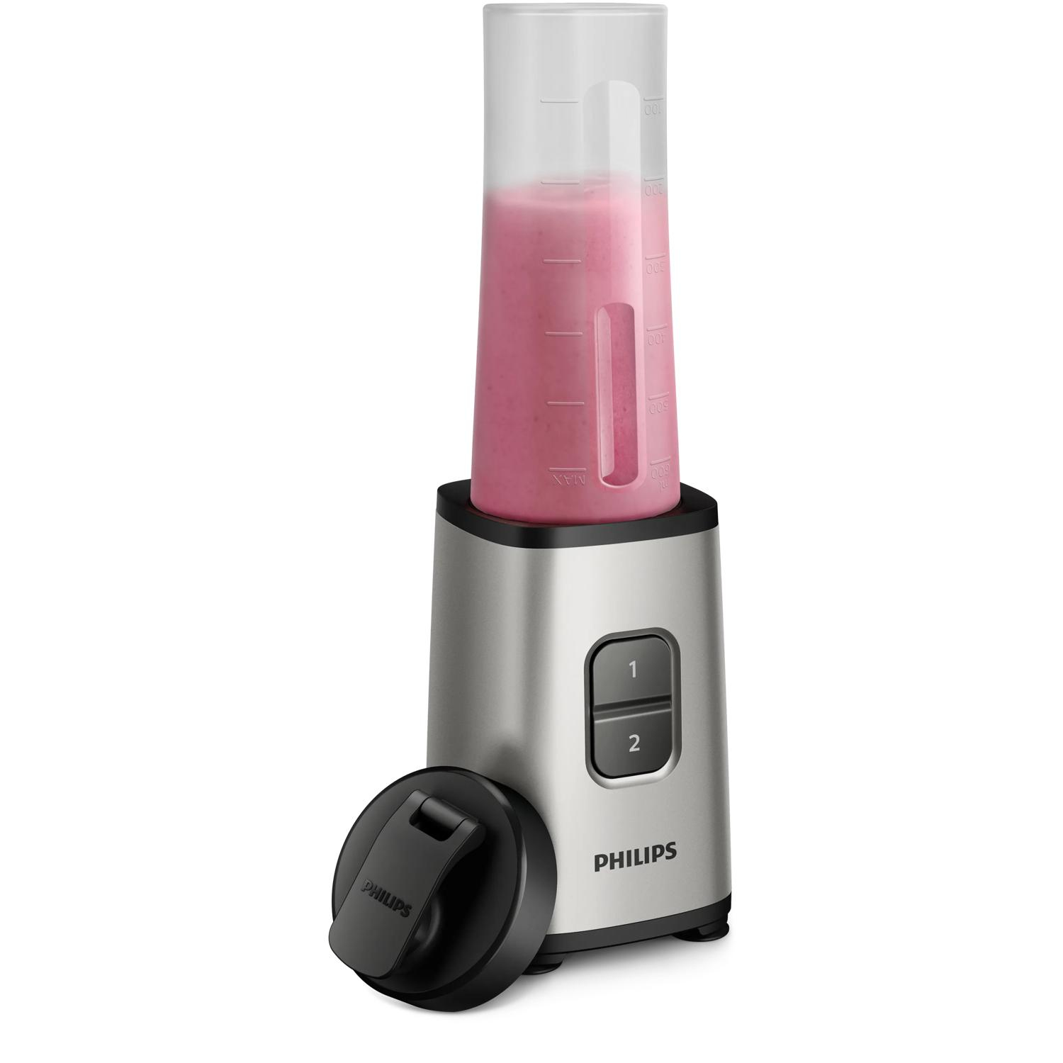 Frullatore Philips argento con frullato rosa nel bicchiere trasparente.