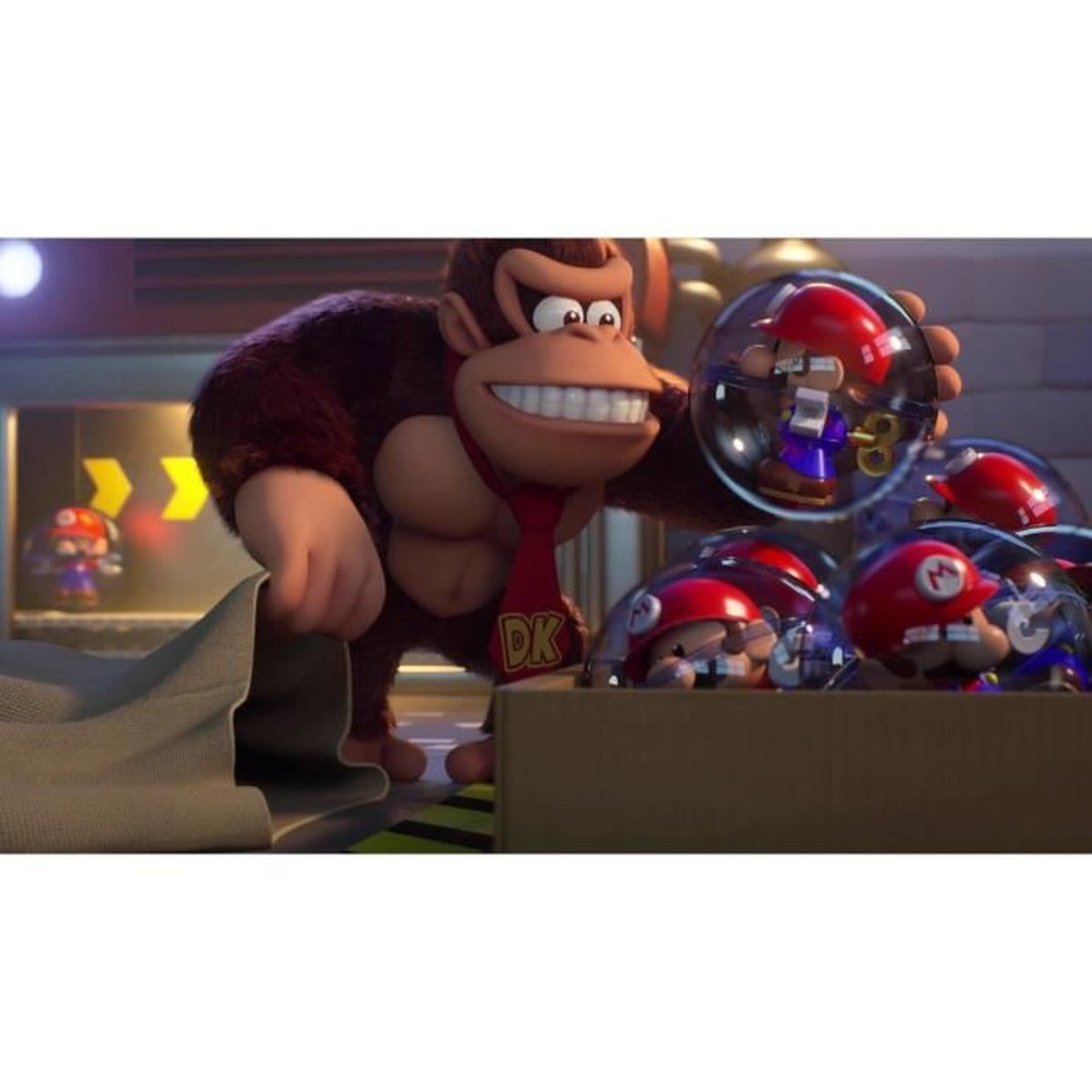 Donkey Kong trzyma kulę z Mario. Więcej Mario w kulach jest w pudełku.