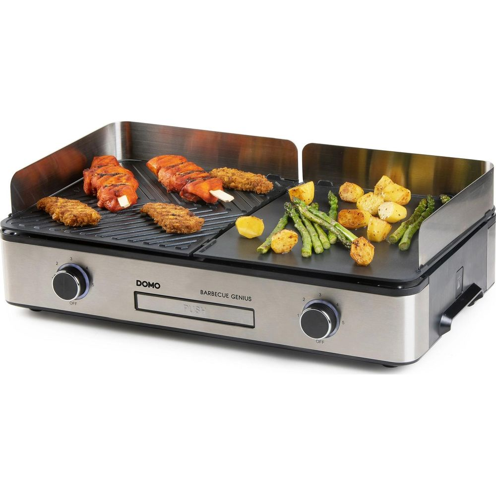 Grill Domo con spiedini di carne, cotolette e verdure.