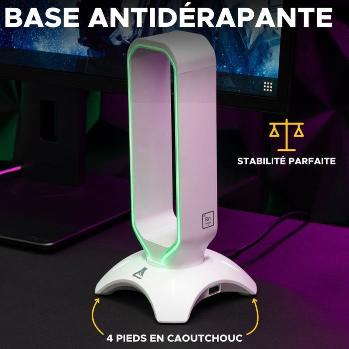Weiße Halterung mit grüner LED-Beleuchtung, auf schwarzem Schreibtisch neben einem Monitor.