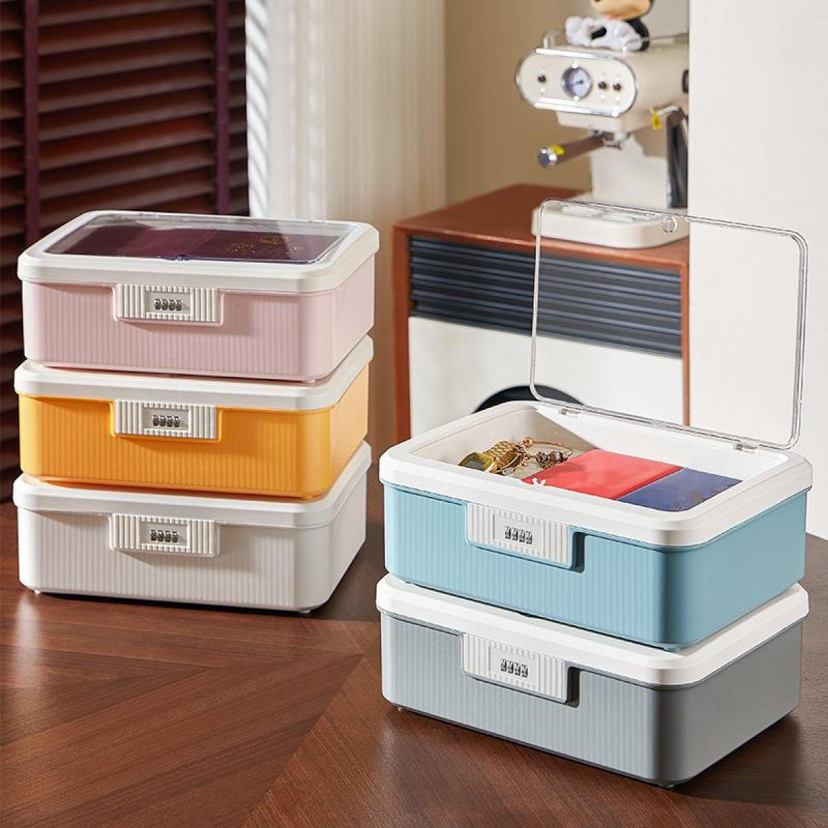 Stapel bunter Aufbewahrungsboxen mit Schlössern. Rosa, orange, weiße, blaue und graue Boxen.