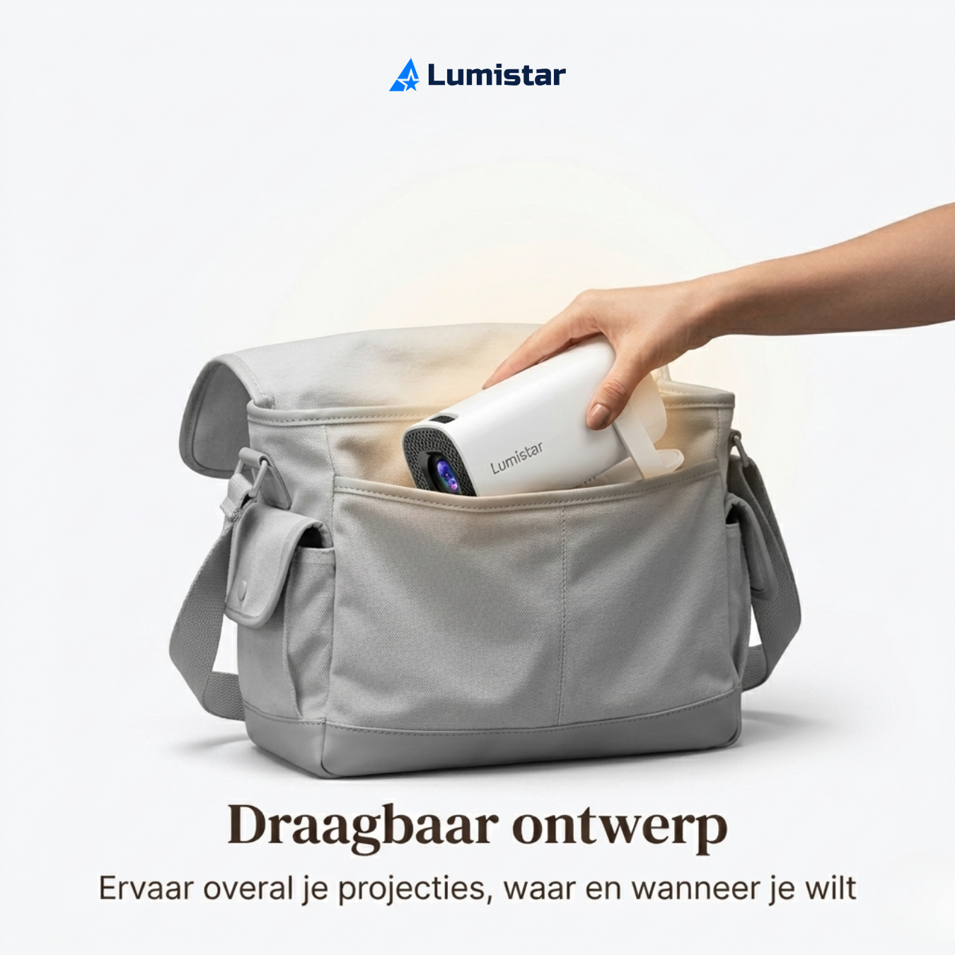 A hand places a white projector into a grey bag. Lumistar logo at the top.