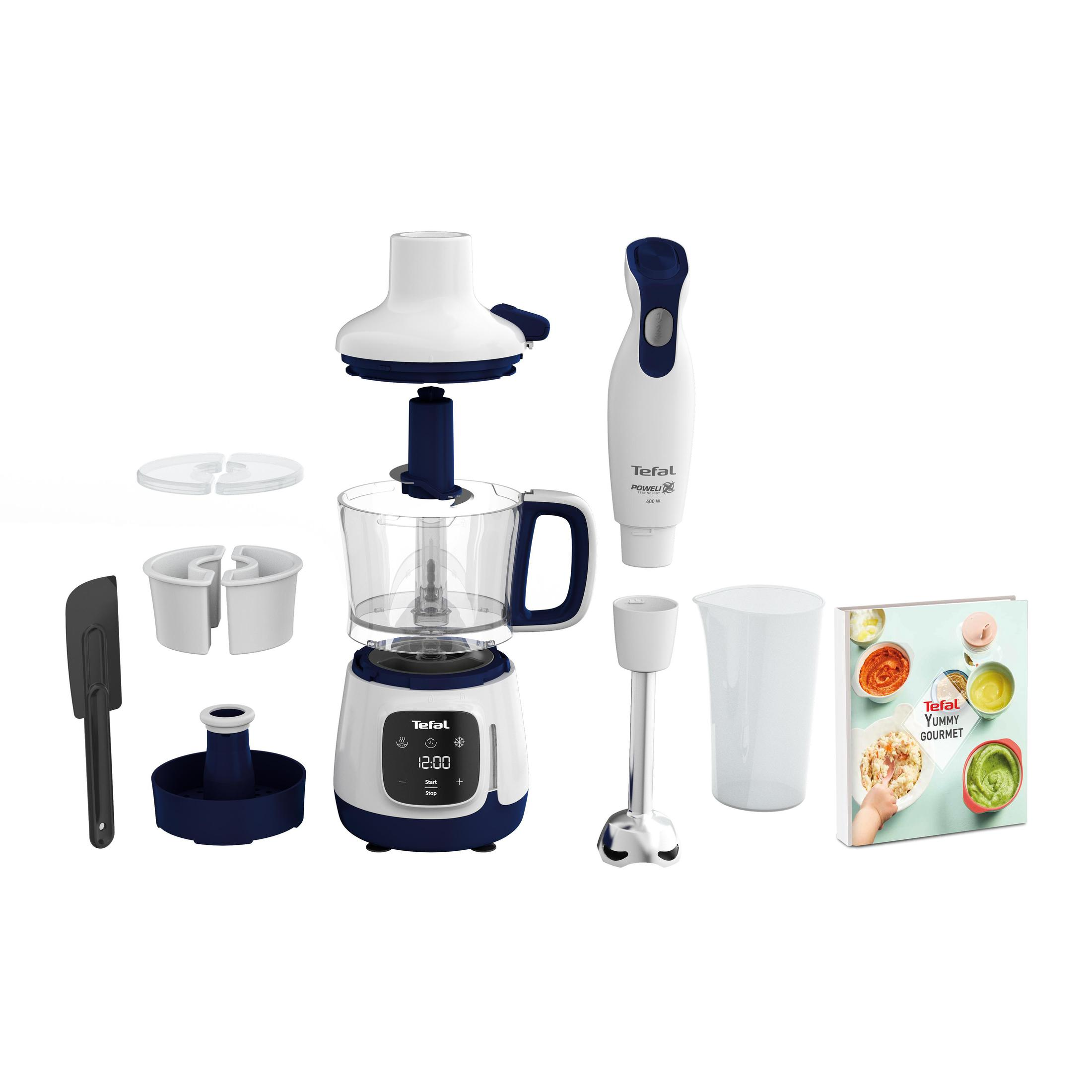 Un set di frullatore a immersione bianco e blu navy con accessori, tra cui un tritatutto, bicchiere e libro.