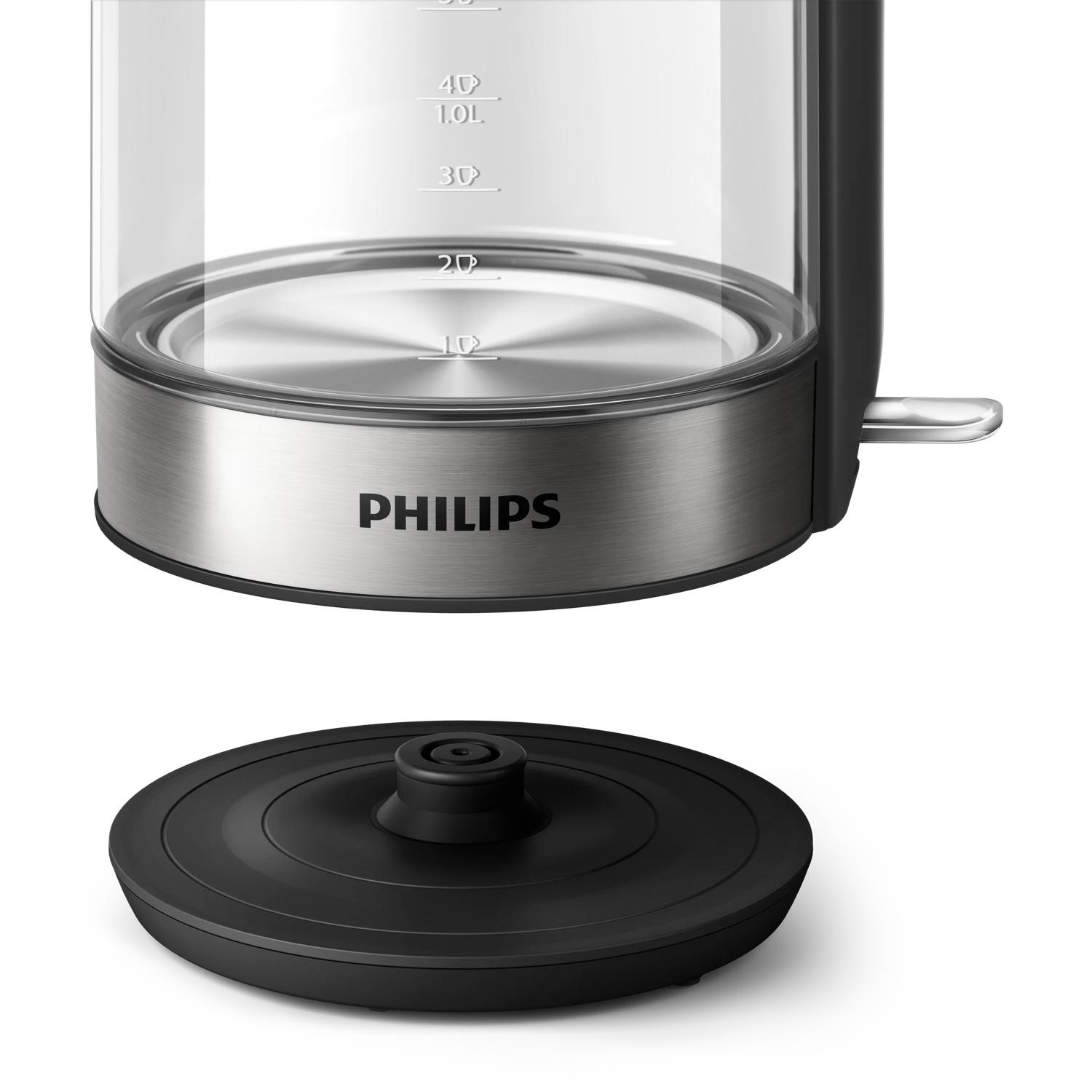 Szklany czajnik z logo Philips i oznaczeniami miary, na czarnej podstawie.