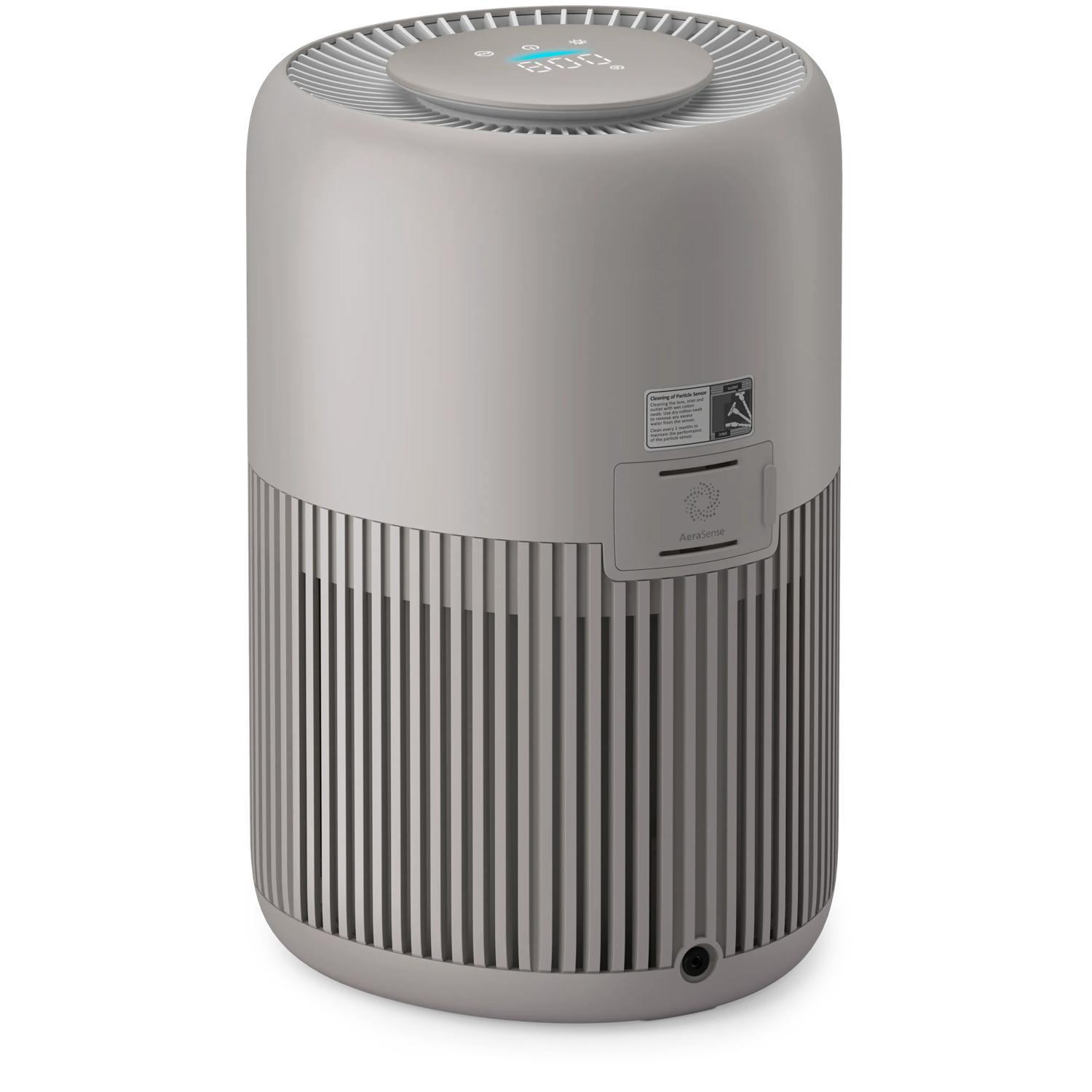 Gray air purifier with vertical slats and a digital display on top.