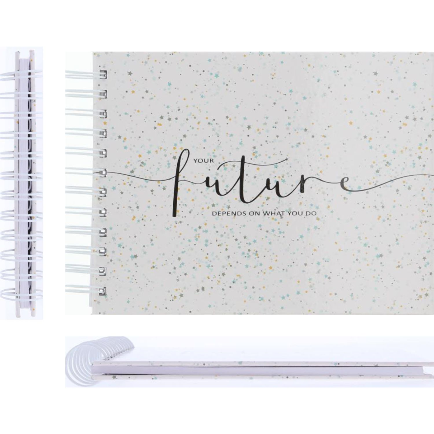 Notatnik bindowany spiralą z nadrukiem gwiazd i napisem 'przyszłość'.
