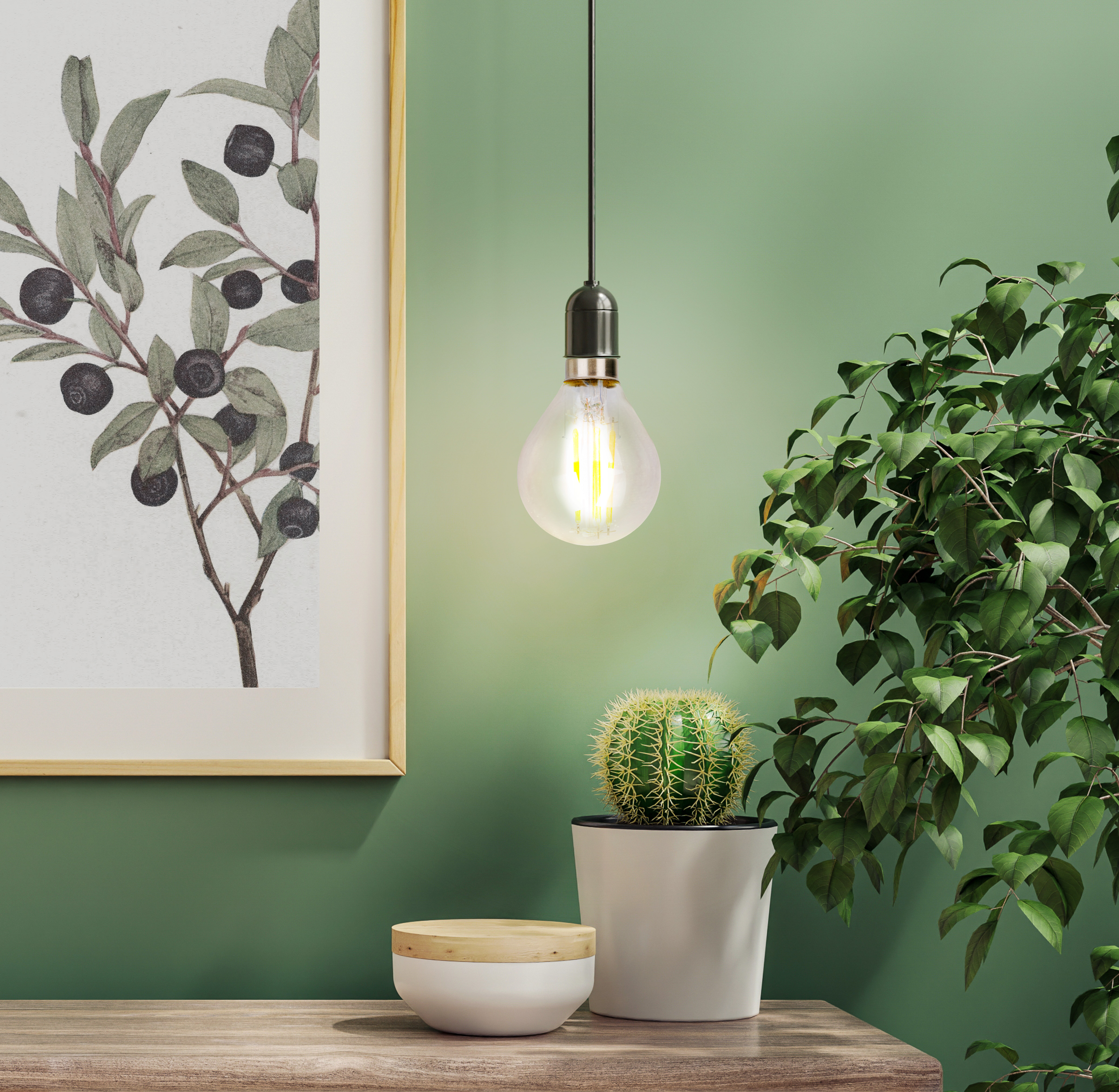 Ein gerahmtes Bild von Beeren und Blättern hängt an einer grünen Wand neben einer Lampe und Pflanzen.