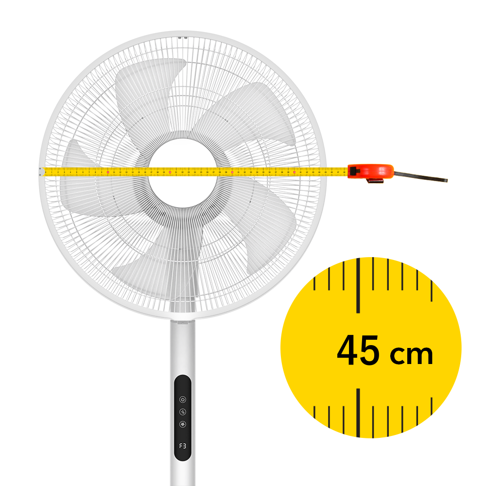 Biały wentylator z miarką wskazującą 45 cm.