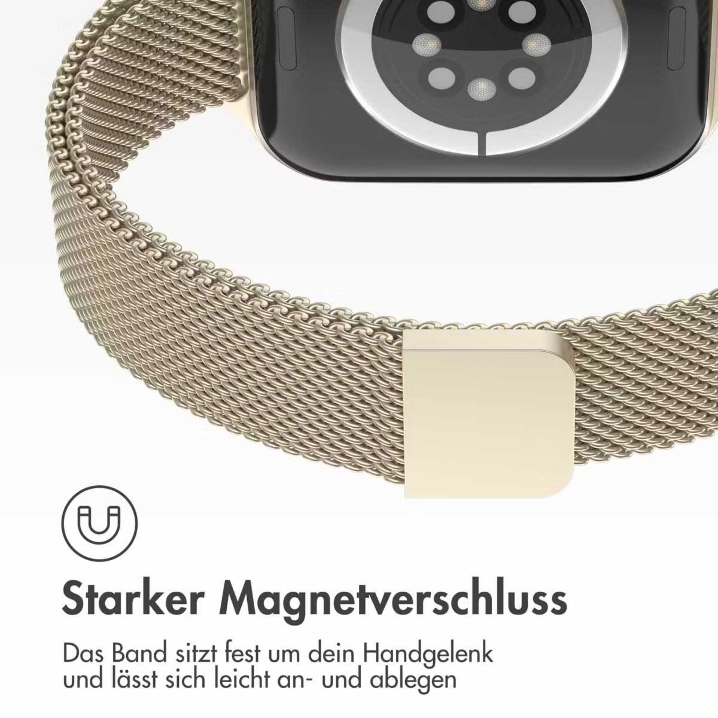 Ein silbernes Mesh-Armband mit Magnetverschluss und einer Uhr im Hintergrund.