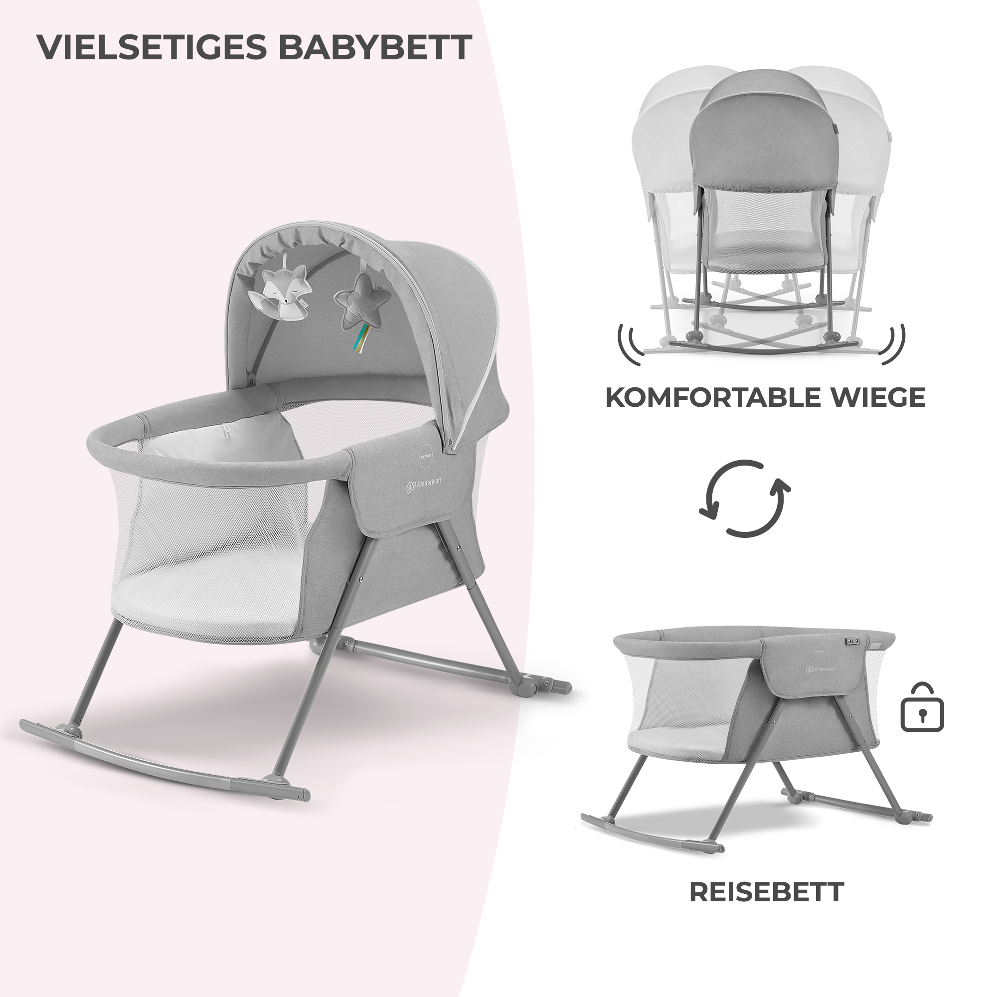 Graues Babybett mit Moskitonetz und Spielzeug