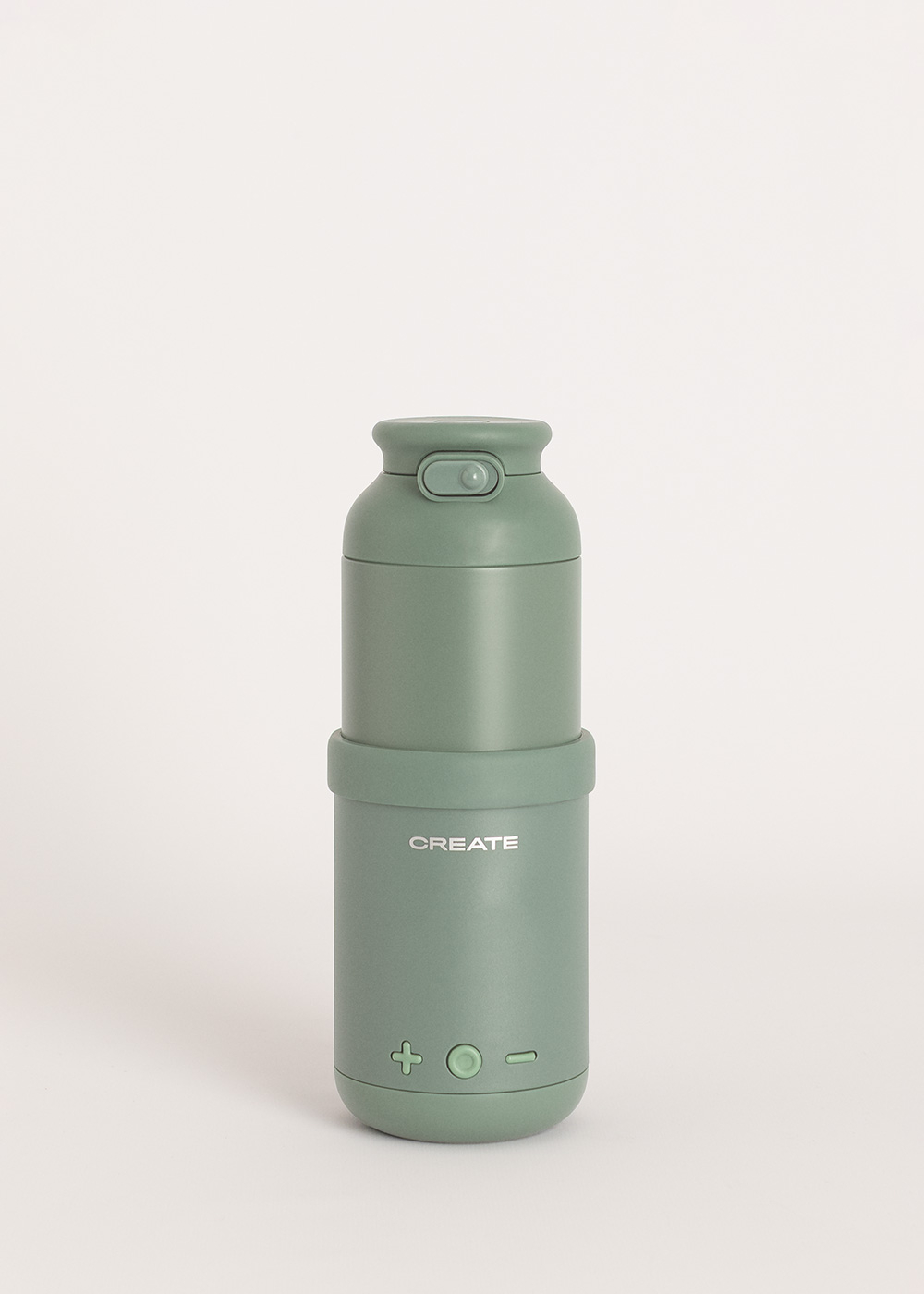 Una botella verde con tapa abatible y la palabra CREATE.