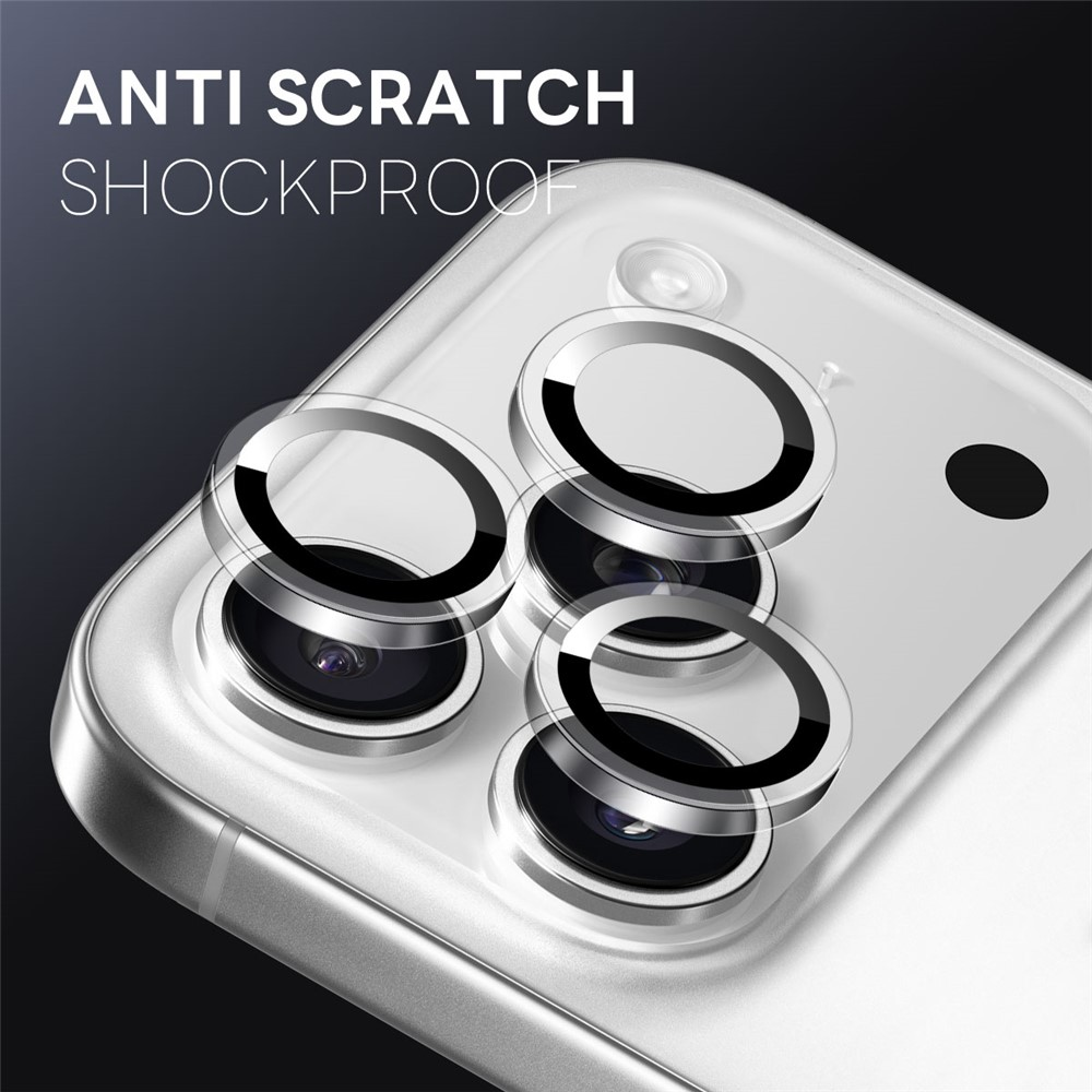 Anneaux de protection pour caméras de smartphone sur un téléphone argenté.