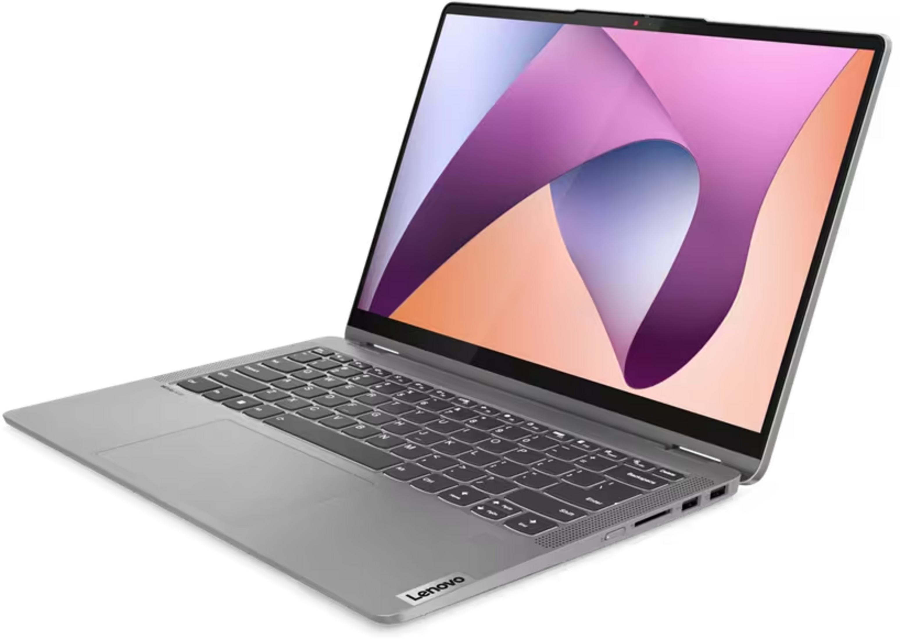 Srebrny laptop Lenovo z klawiaturą i ekranem wyświetlającym abstrakcyjną grafikę.