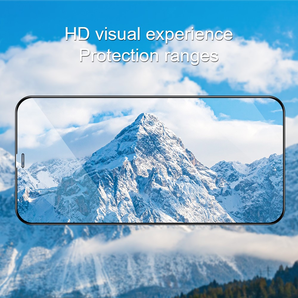 Un écran de smartphone affiche une montagne enneigée sous un ciel bleu avec des nuages.