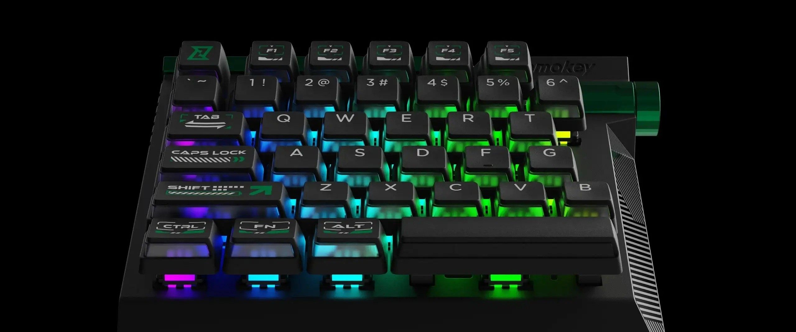 Czarna klawiatura z kolorowym podświetleniem, widziana z góry.