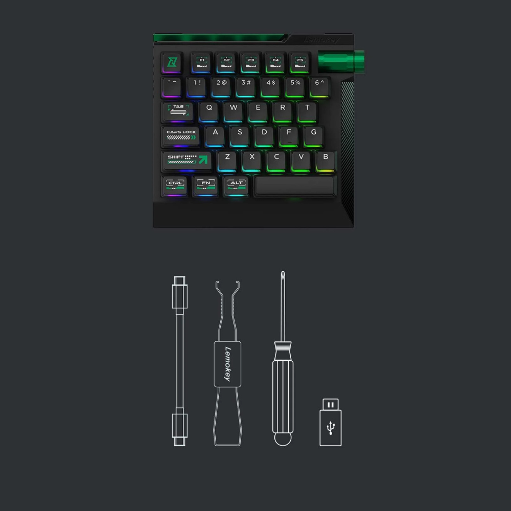 Zbliżenie podświetlanej klawiatury z akcesoriami. Zawiera kabel, pęsetę, śrubokręt.