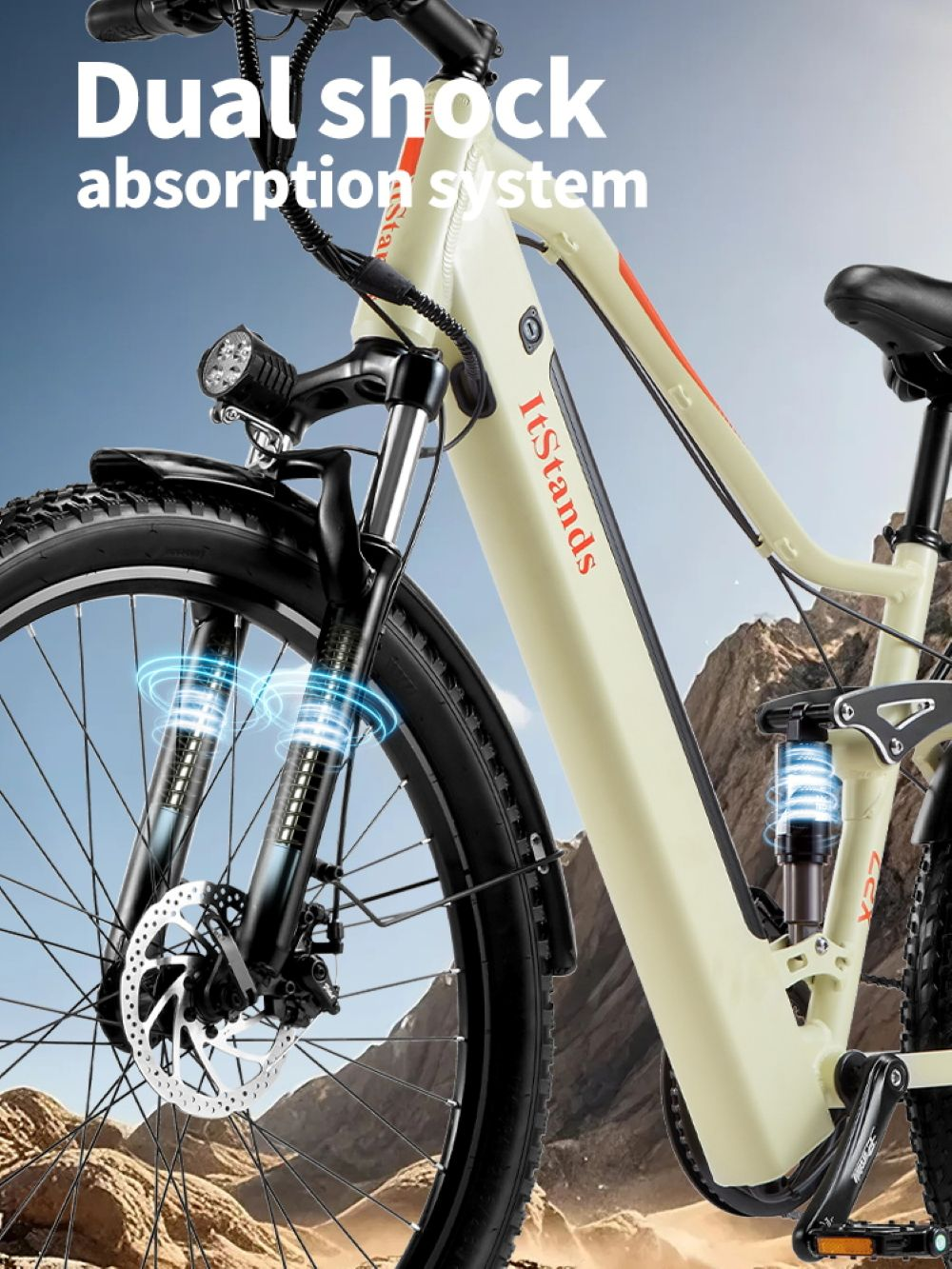 E-bike beige con doppio ammortizzatore, sfondo montuoso.
