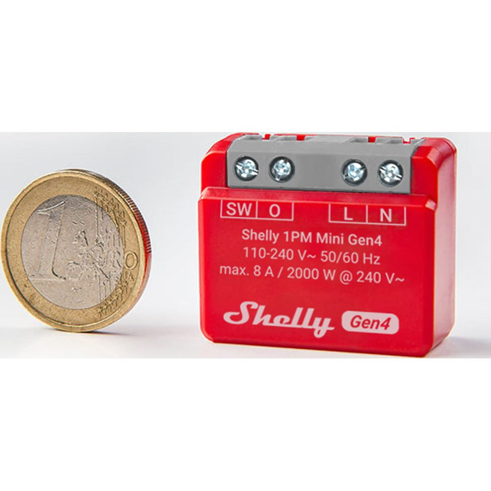 Czerwony Shelly 1PM Mini Gen4 obok monety euro.