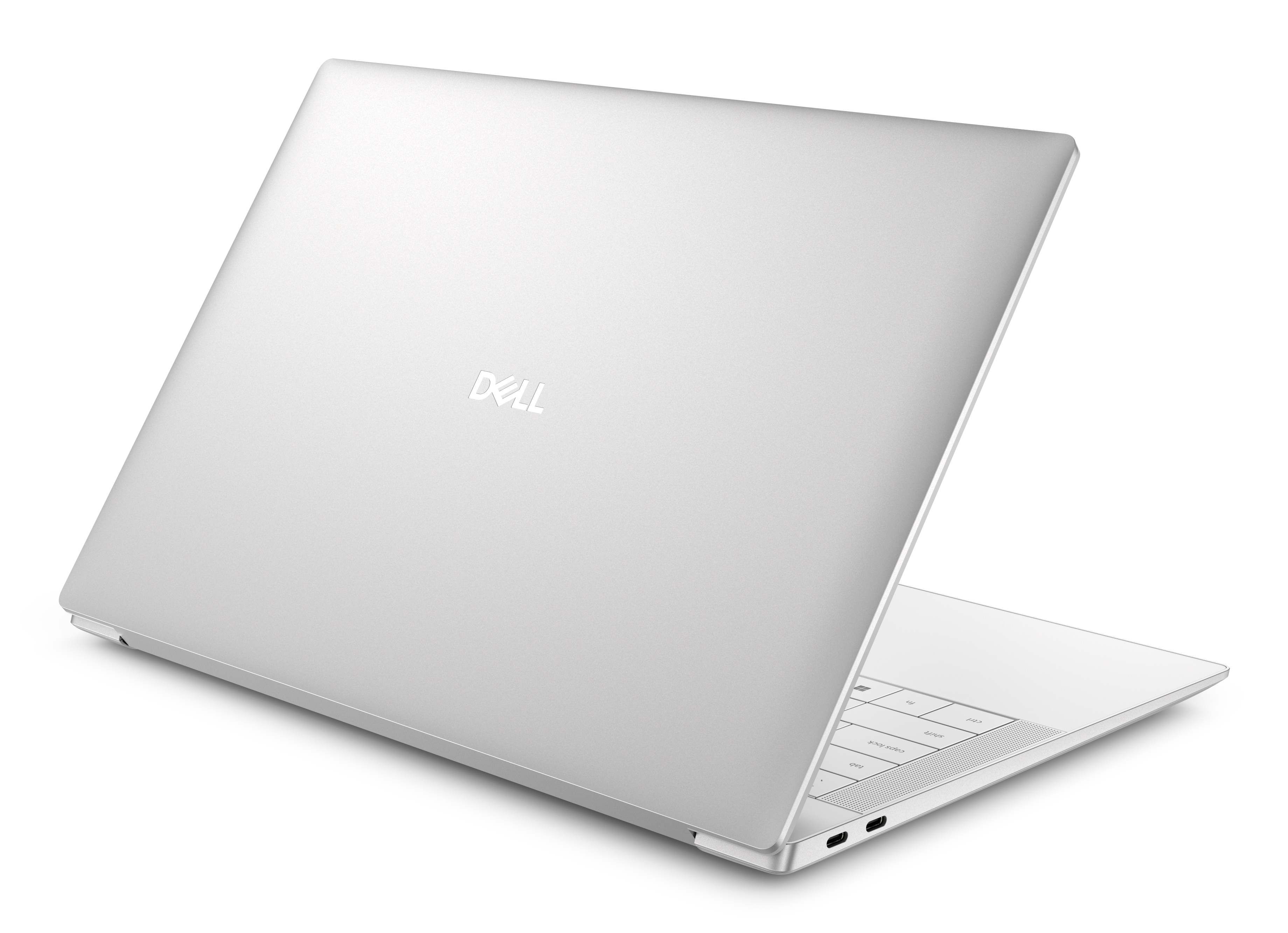 Een zilveren Dell laptop met open deksel, die het witte toetsenborddek en de poorten toont.